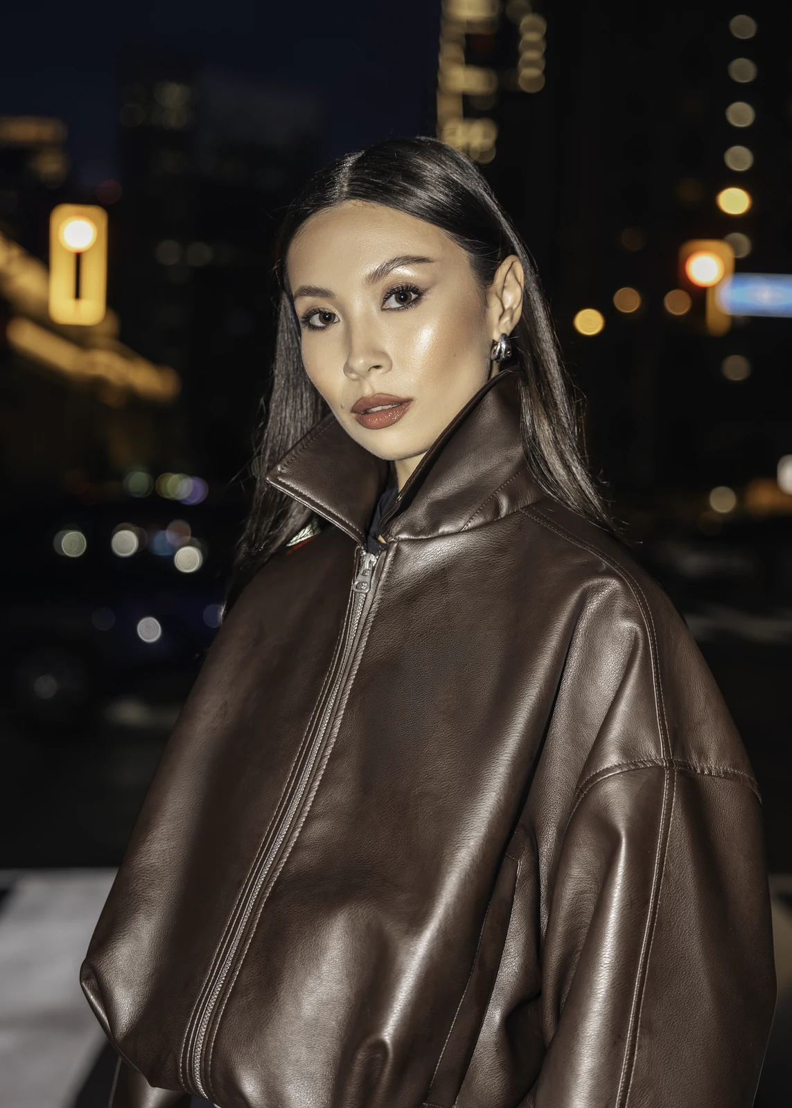 Editorial portrait from a city photography session in Toronto — urban backdrop, natural light.