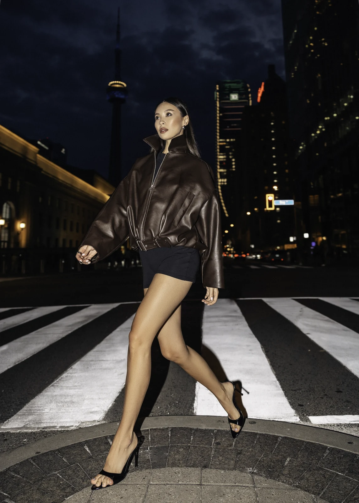 Editorial portrait from a city photography session in Toronto — urban backdrop, natural light.
