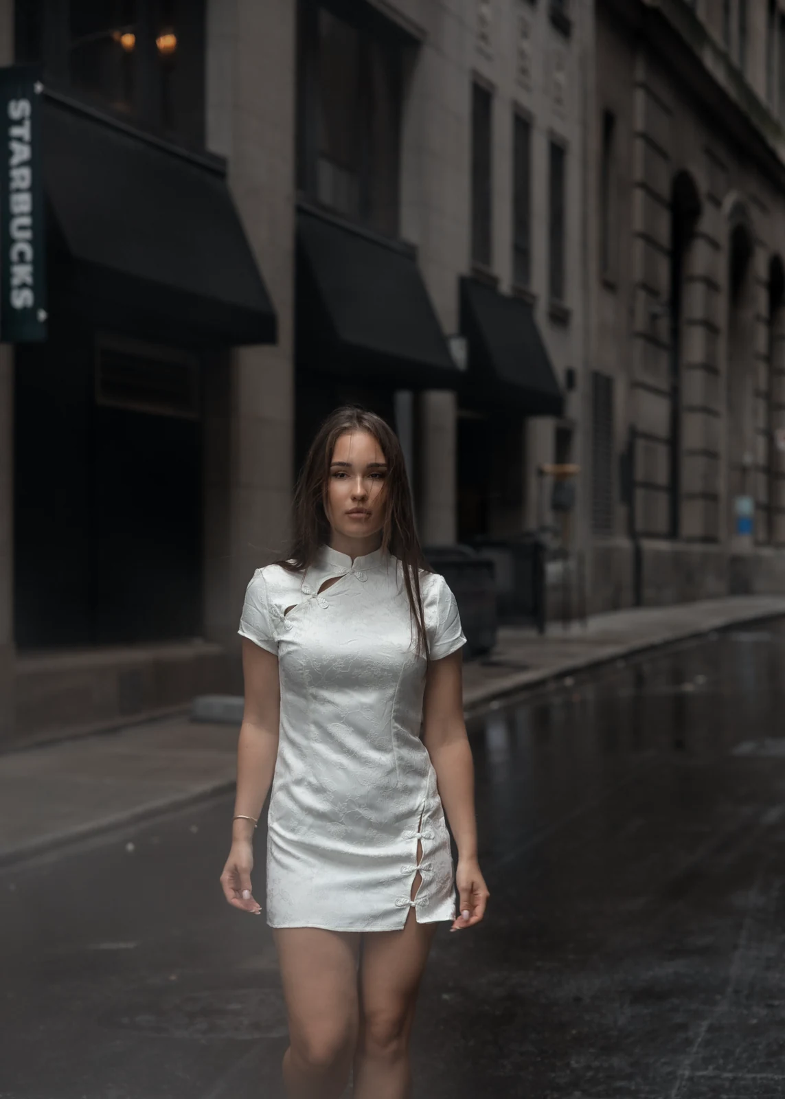 Editorial portrait from a city photography session in Toronto — urban backdrop, natural light.
