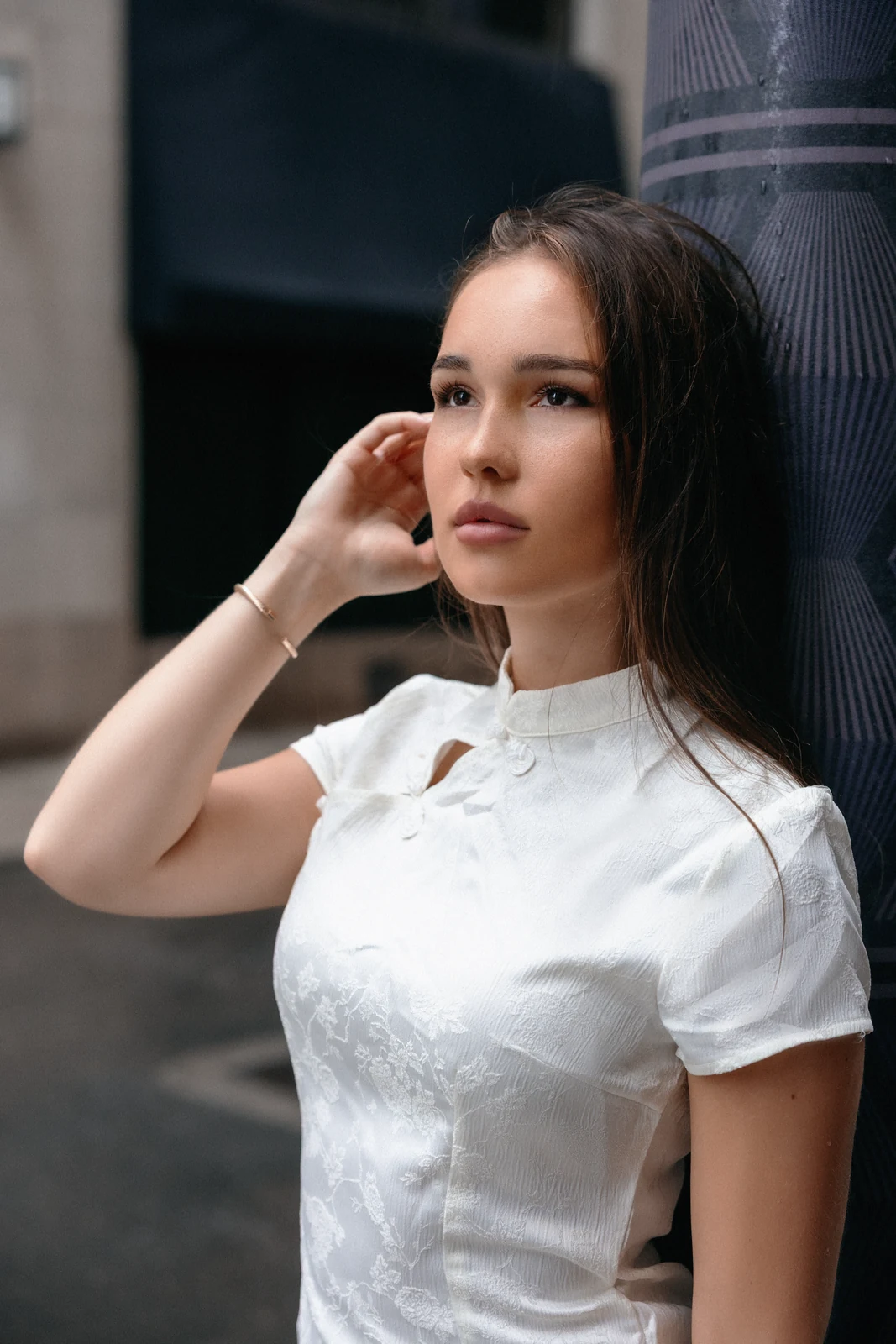 Editorial portrait from a city photography session in Toronto — urban backdrop, natural light.
