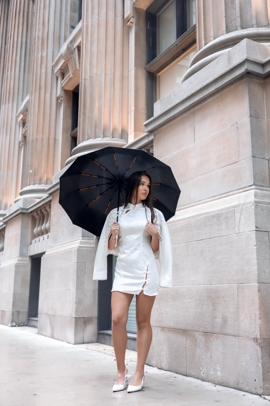 Editorial portrait from a city photography session in Toronto — urban backdrop, natural light.