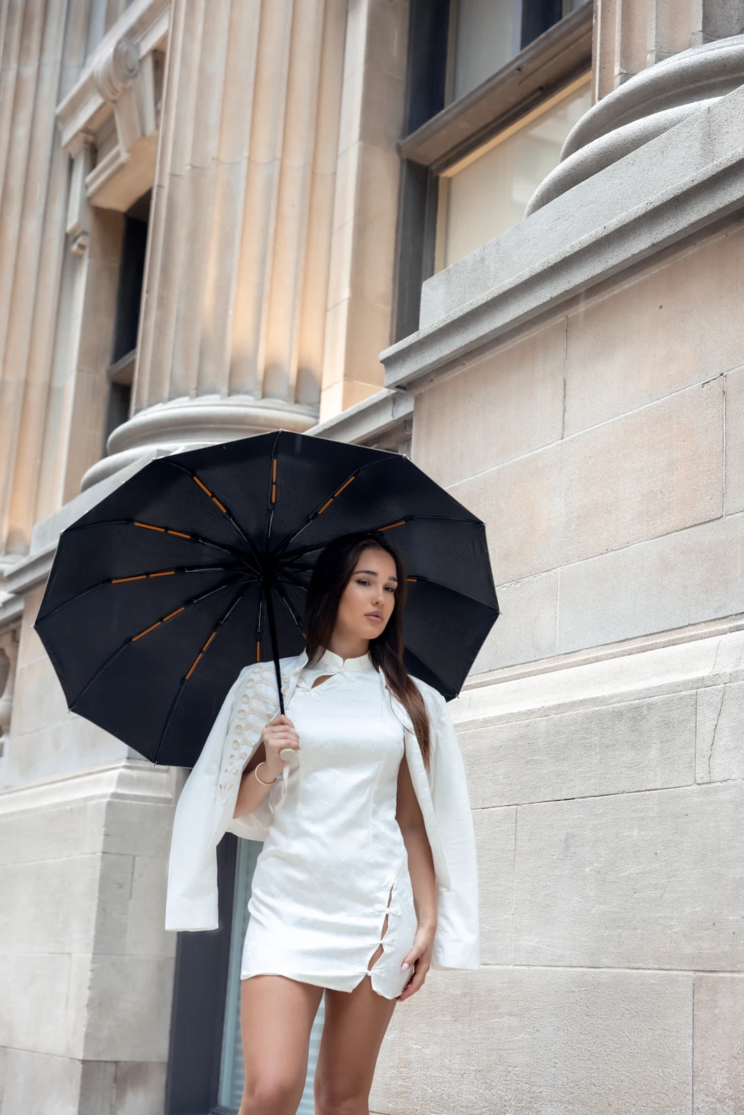 Editorial portrait from a city photography session in Toronto — urban backdrop, natural light.