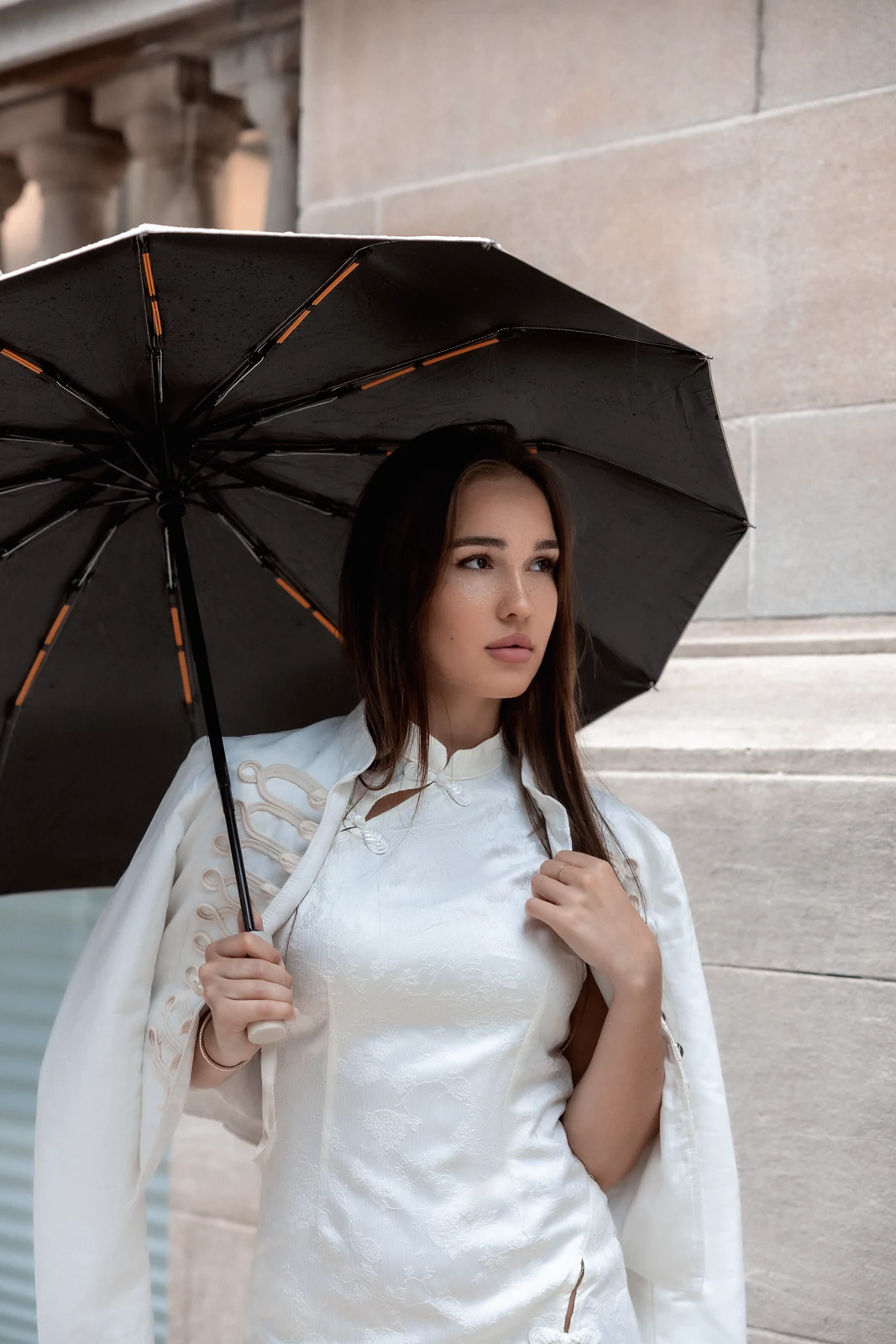 Editorial portrait from a city photography session in Toronto — urban backdrop, natural light.