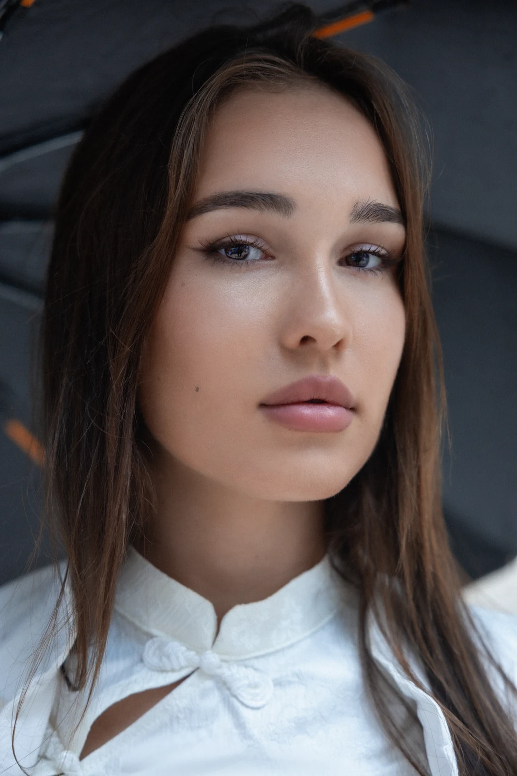 Editorial portrait from a city photography session in Toronto — urban backdrop, natural light.