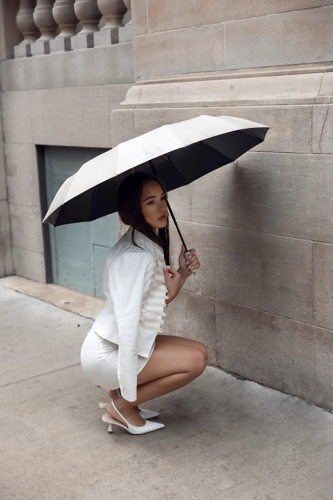Editorial portrait from a city photography session in Toronto — urban backdrop, natural light.